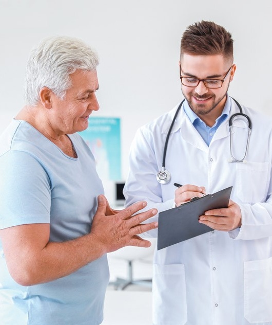 Doctor reviewing brain scan with patient